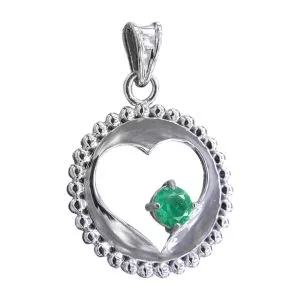 Dije en plata con esmeralda colombiana.